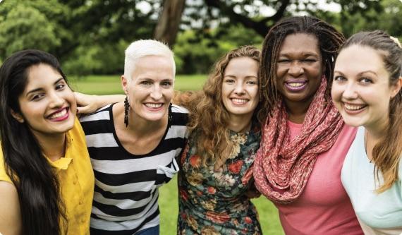 a group of women smiling