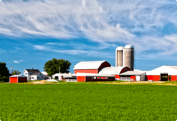 a farm with a few buildings