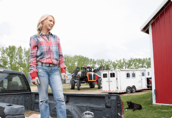 a person standing next to a truck