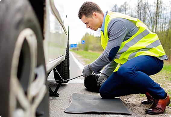 a man fixing a tire