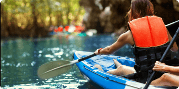 people paddling a kayak