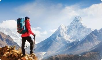 a man hiking on a mountain