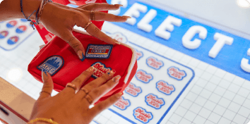 A guest making a customized fanny pack