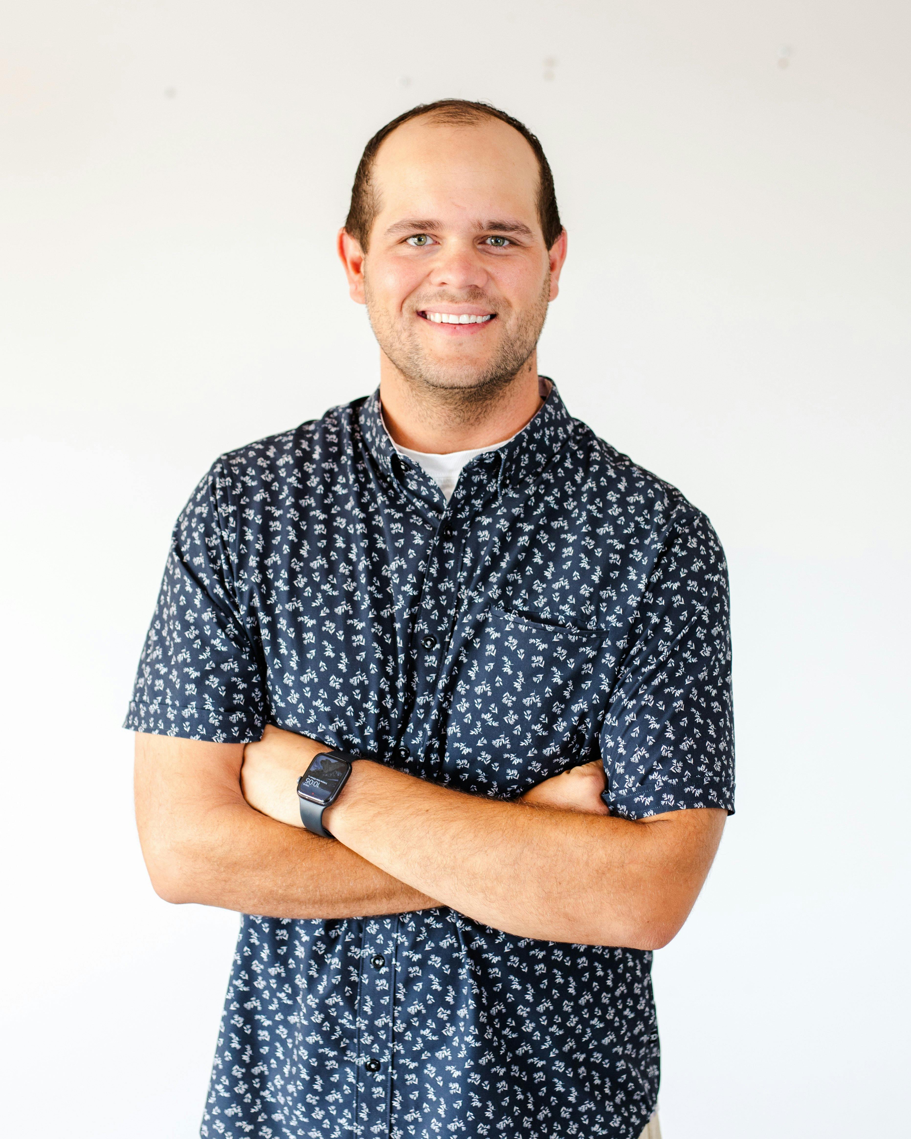 a man folding his arms