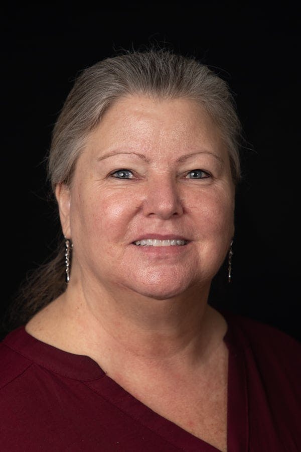 a close-up of a person smiling