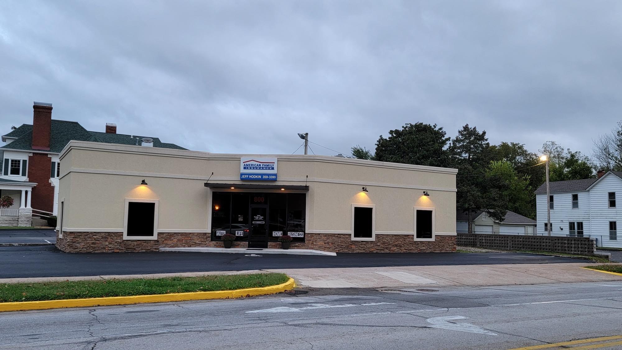 a building with a parking lot