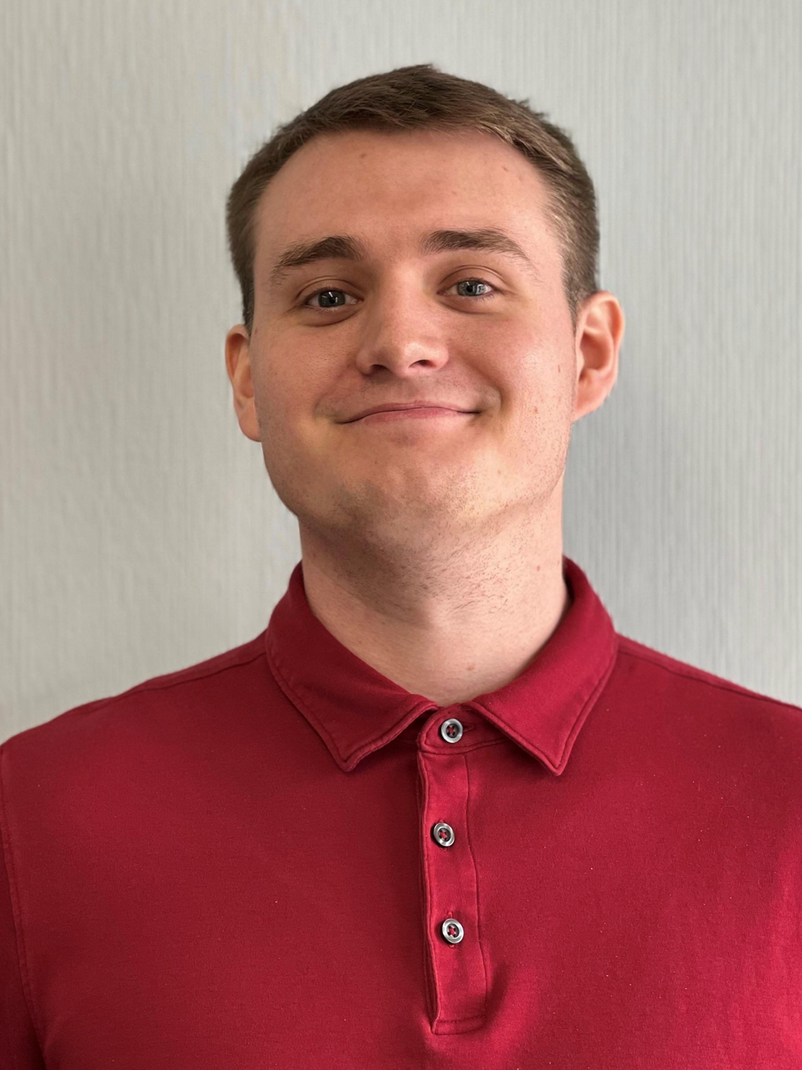 a man wearing a red shirt