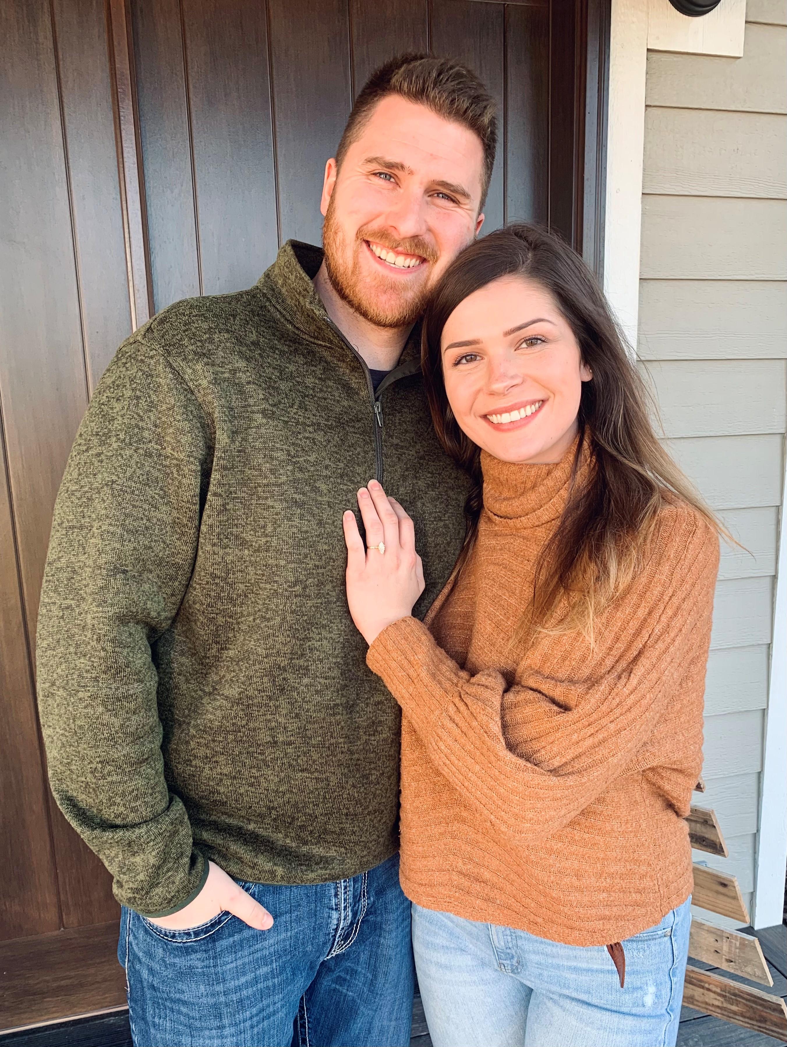 a man and woman posing for a picture