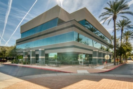 a building with palm trees