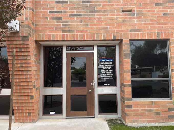 a brick building with a sign on the front