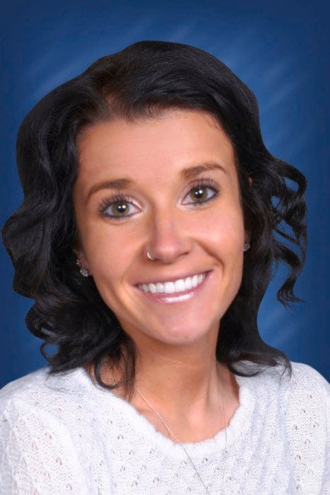 a close-up of a woman smiling