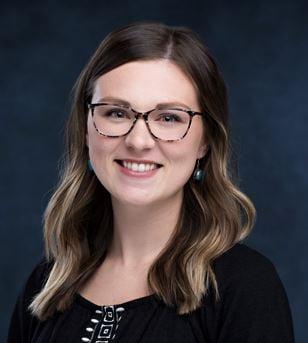 a woman wearing glasses