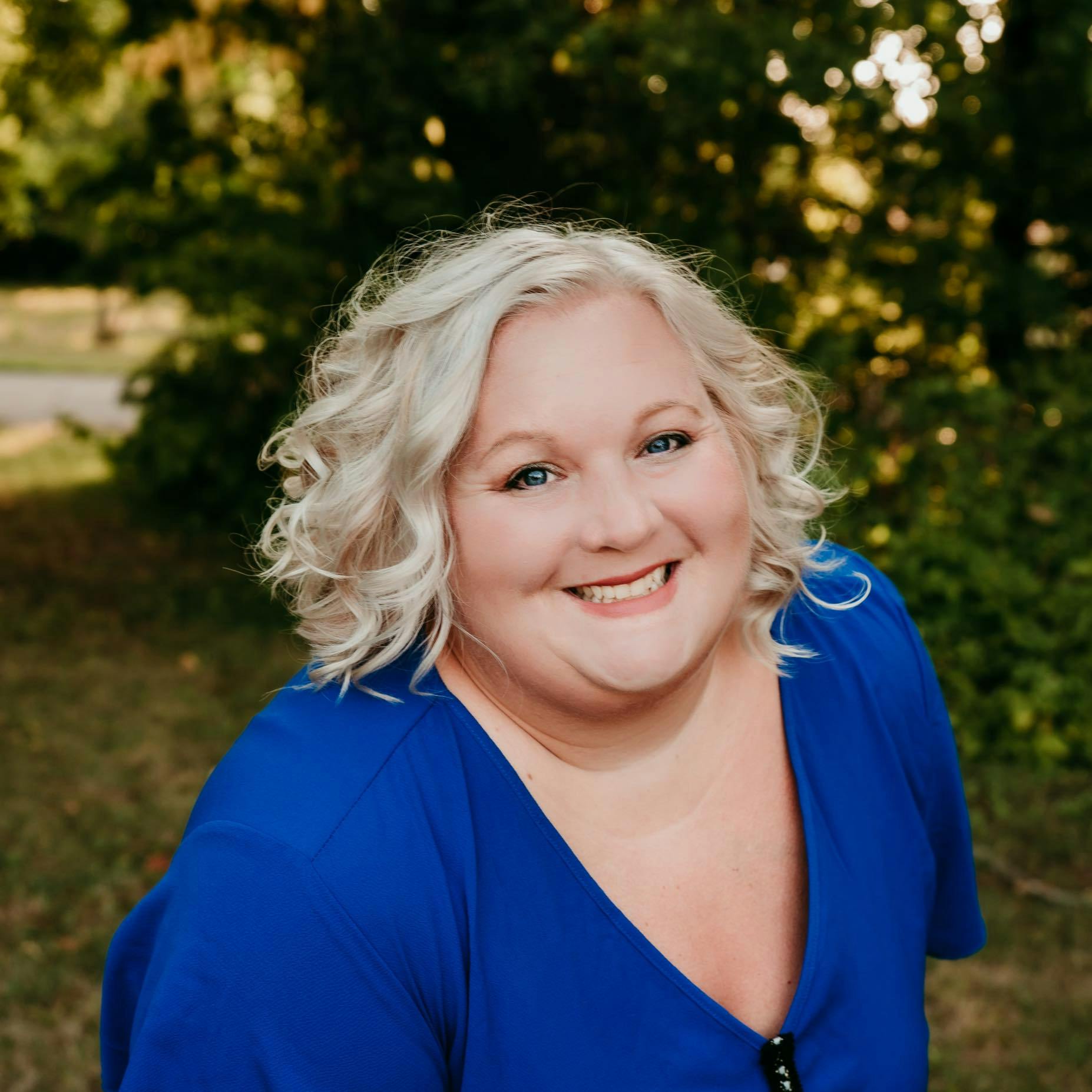 a woman smiling for the camera