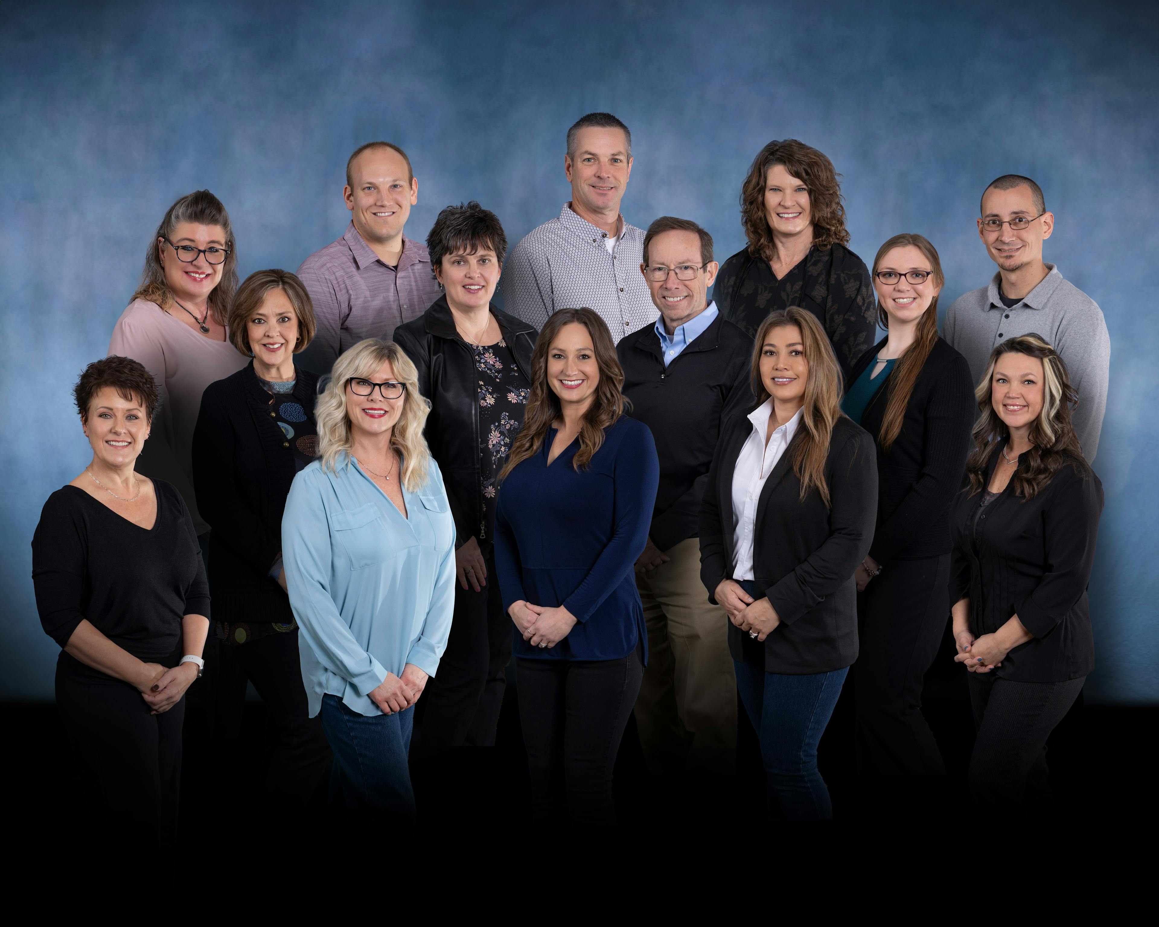 a group of people posing for a photo