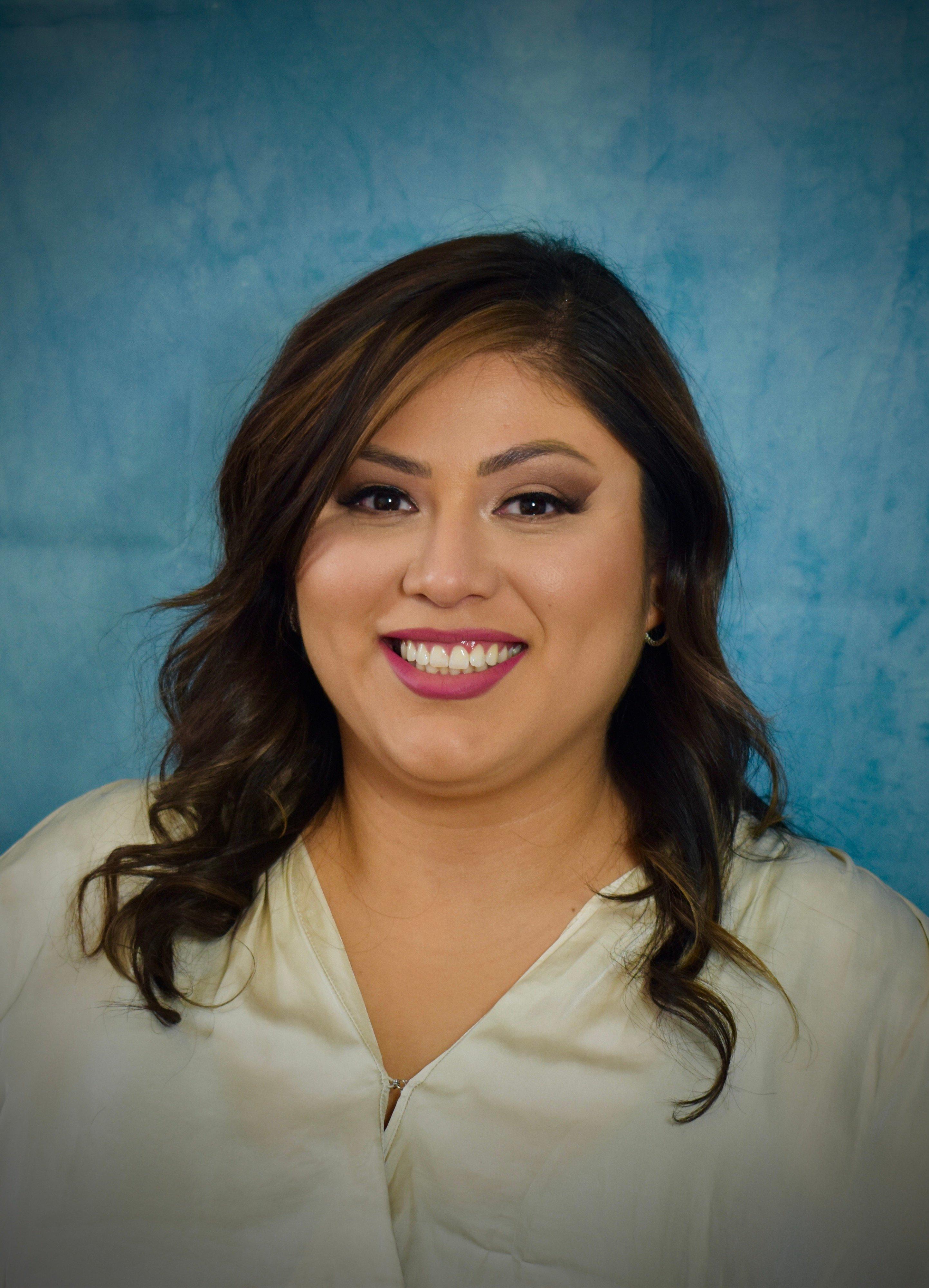 a woman smiling for the camera