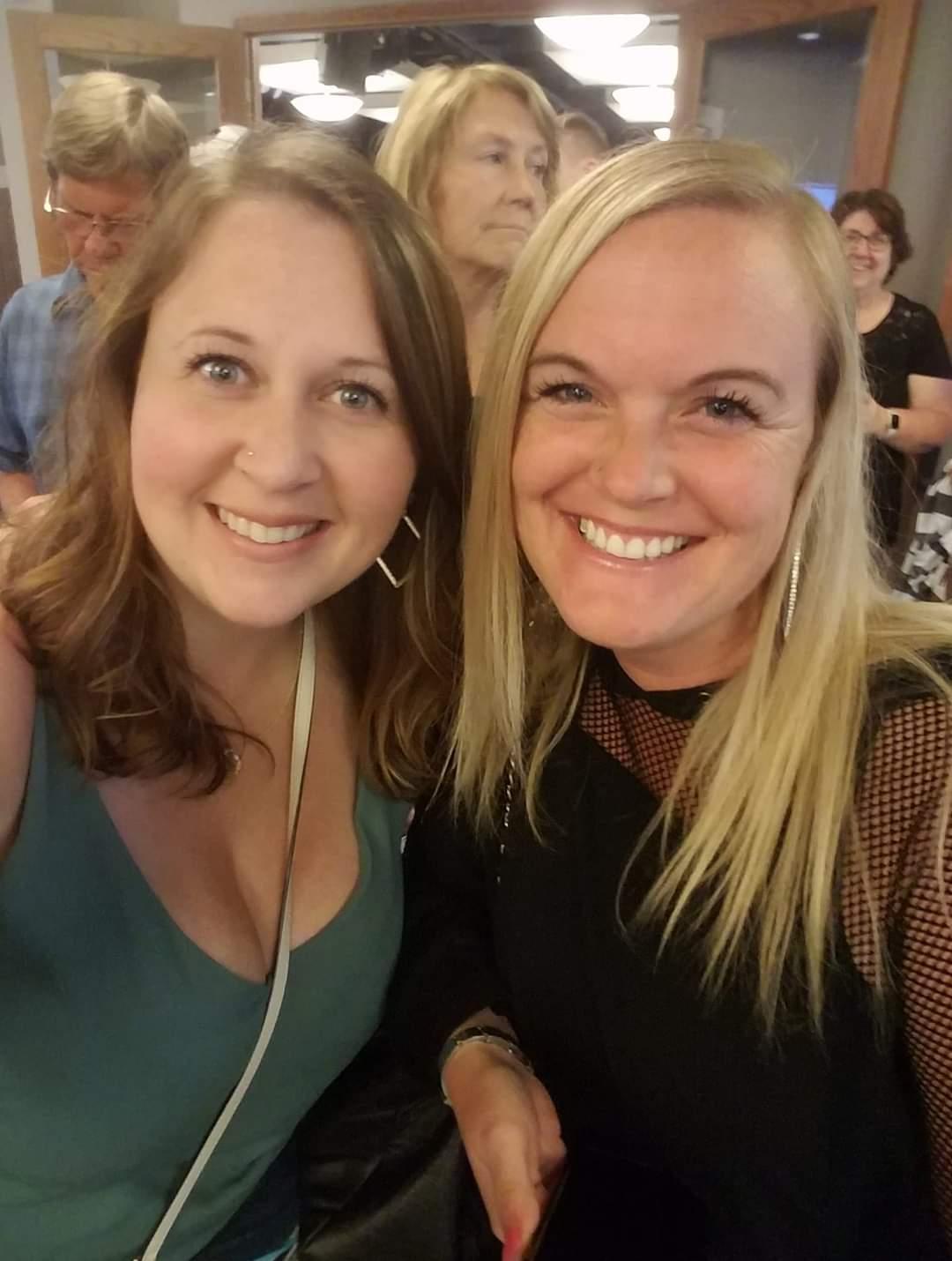 a couple of women smiling