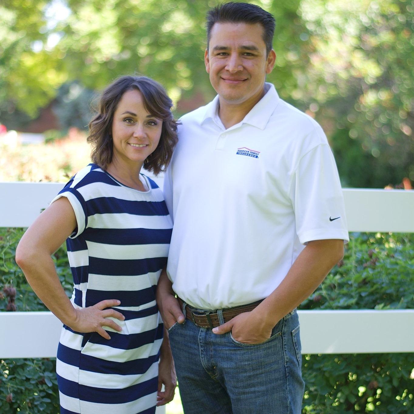 a man and a woman posing for a photo