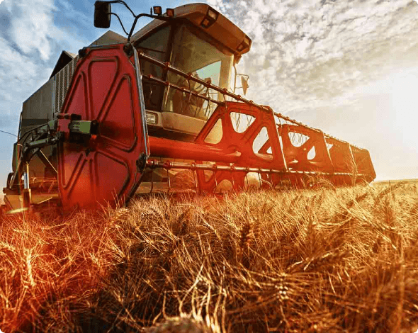 farm equipment working in a field