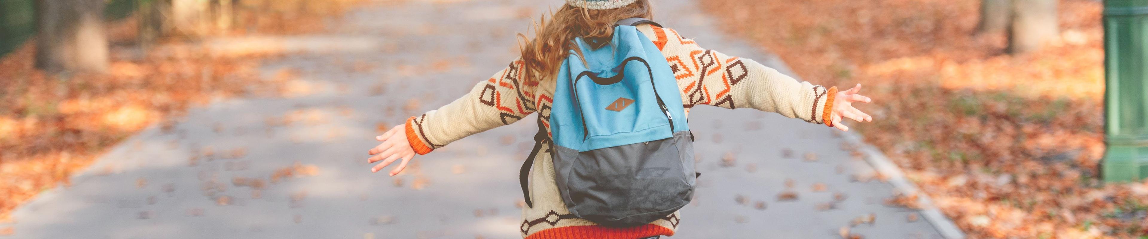 Young girl wearing her new backpack for back to school.