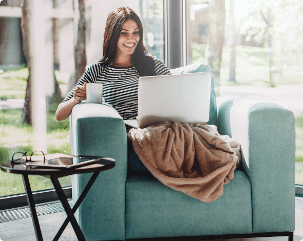 Young woman sitting on couch learning about My Account.