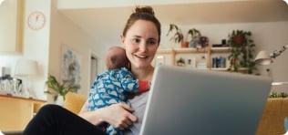 a person holding a baby