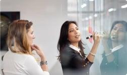 a woman drawing a picture