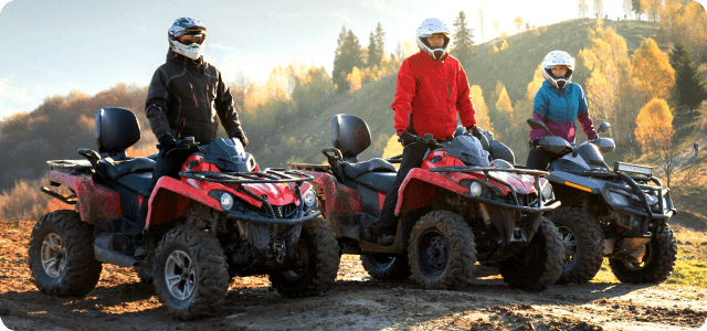 A group of riders on their ATVs