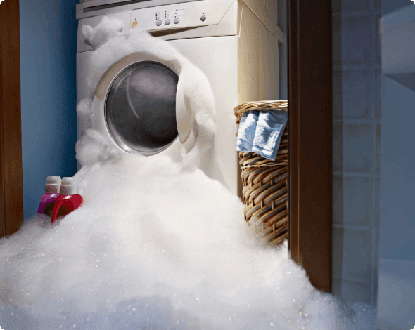 An overflowing washing machine.