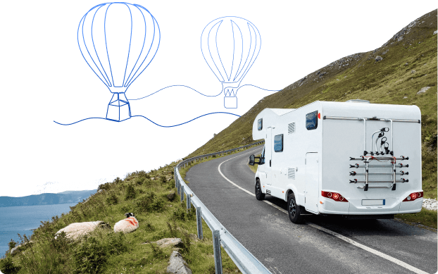 an RV on a road with doodles of hot air balloons above