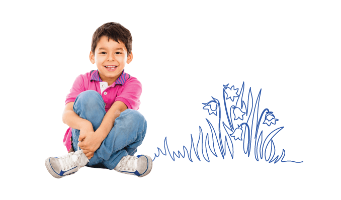 a boy sitting on the floor